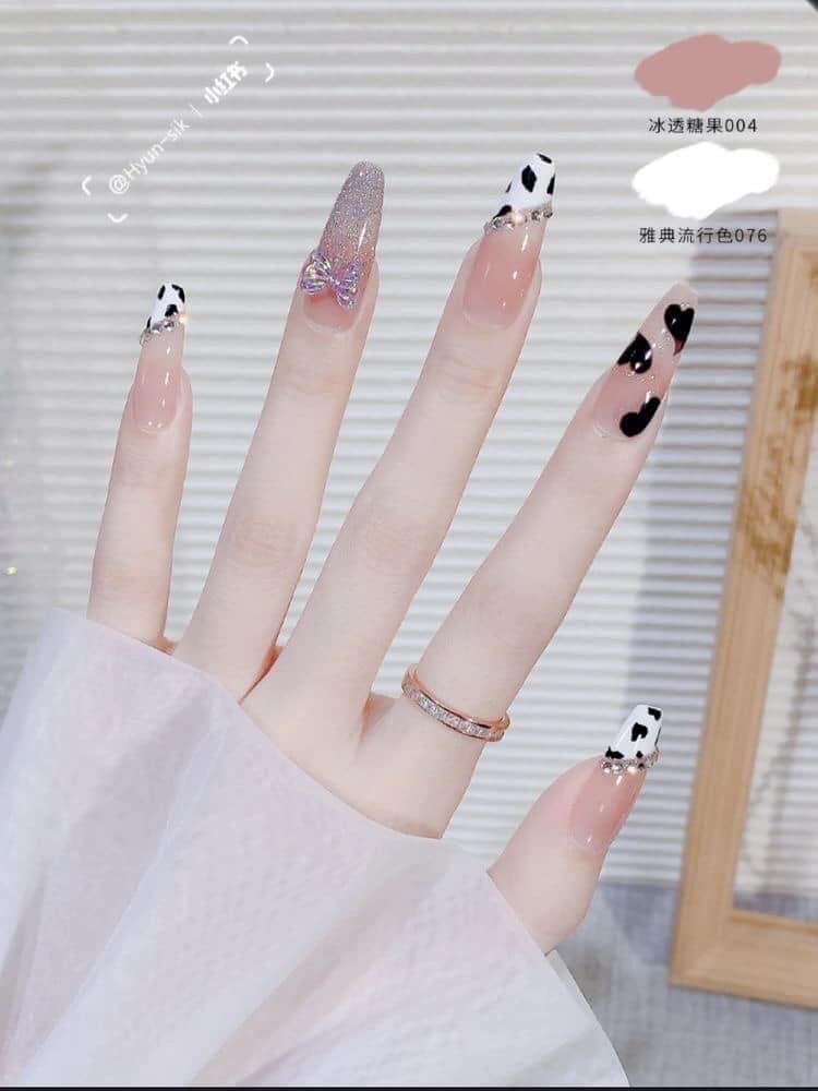 Nailbox trái tim bò sữa đính nơ cầu vồng