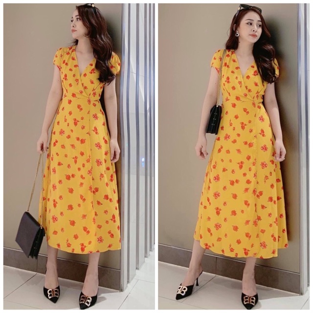 Đầm vàng hoa đỏ xẻ tà