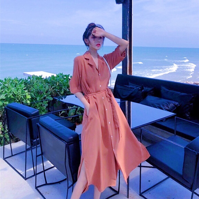 Đầm sm hồng ruốc nút trắng