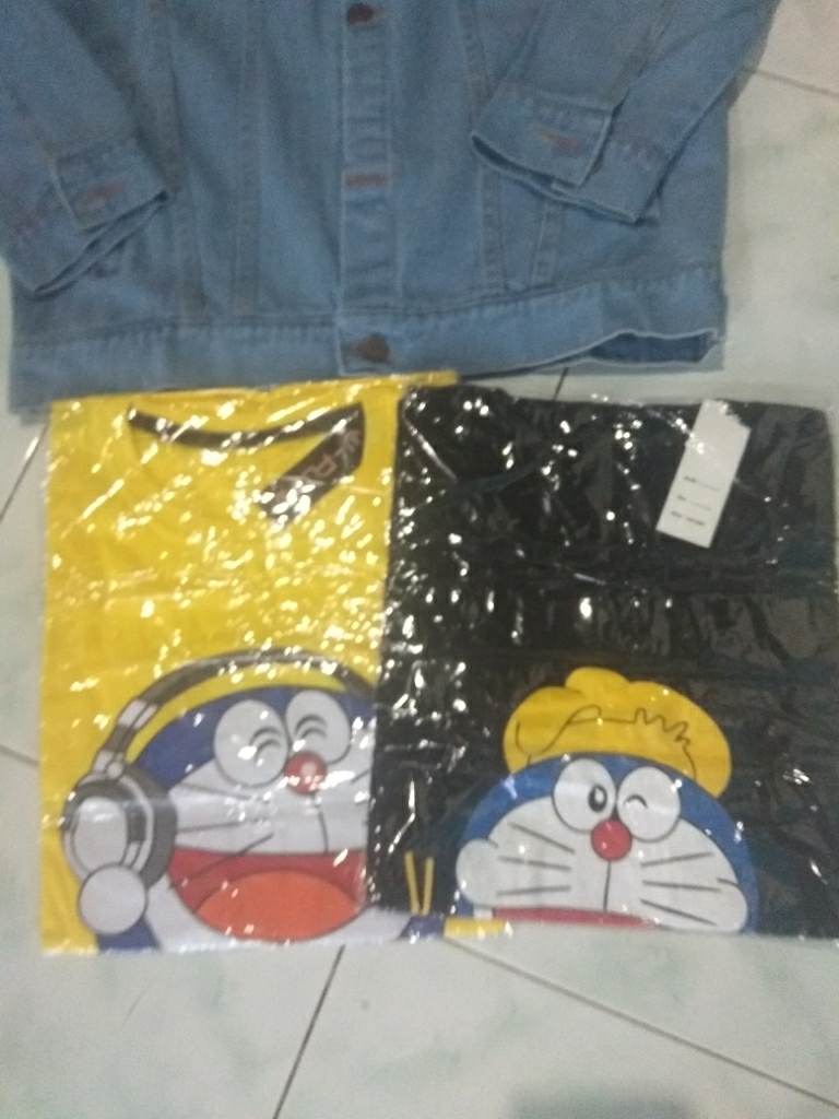BANG KAOS DISTRO DORAEMON EATING SUSHI HITAM KAOS DISTRO KAOS PRIA BAJU DISTRO BAJU PRIA