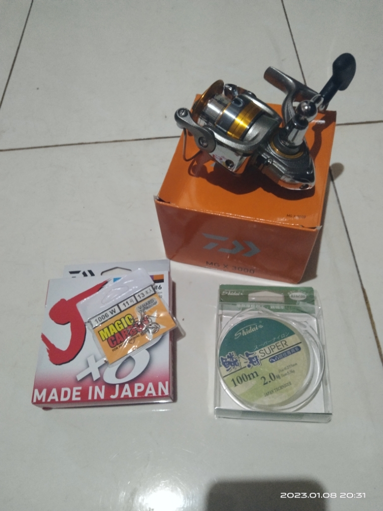 Reel Pancing Spinning Daiwa MG-X 2000 / 2500 / 3000 Indonesia