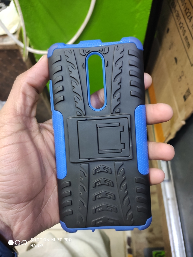  Tire Texture TPU+PC Shockproof Protective Case with Holder for Xiaomi Mi 9T / 9T Pro / Redmi K20 / K20 Pro(Black)
