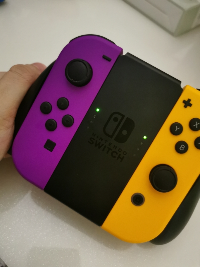 Boitier pour Joycon Violet / Orange Nintendo Switch