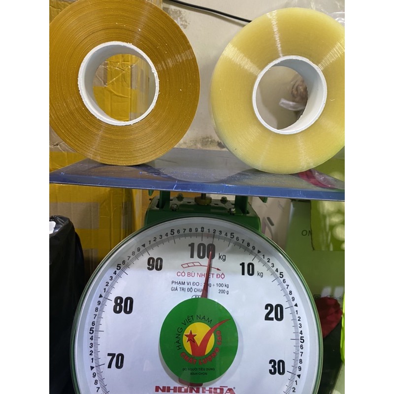  Băng dính cuộn 1kg lõi mỏng trắng và vàng 