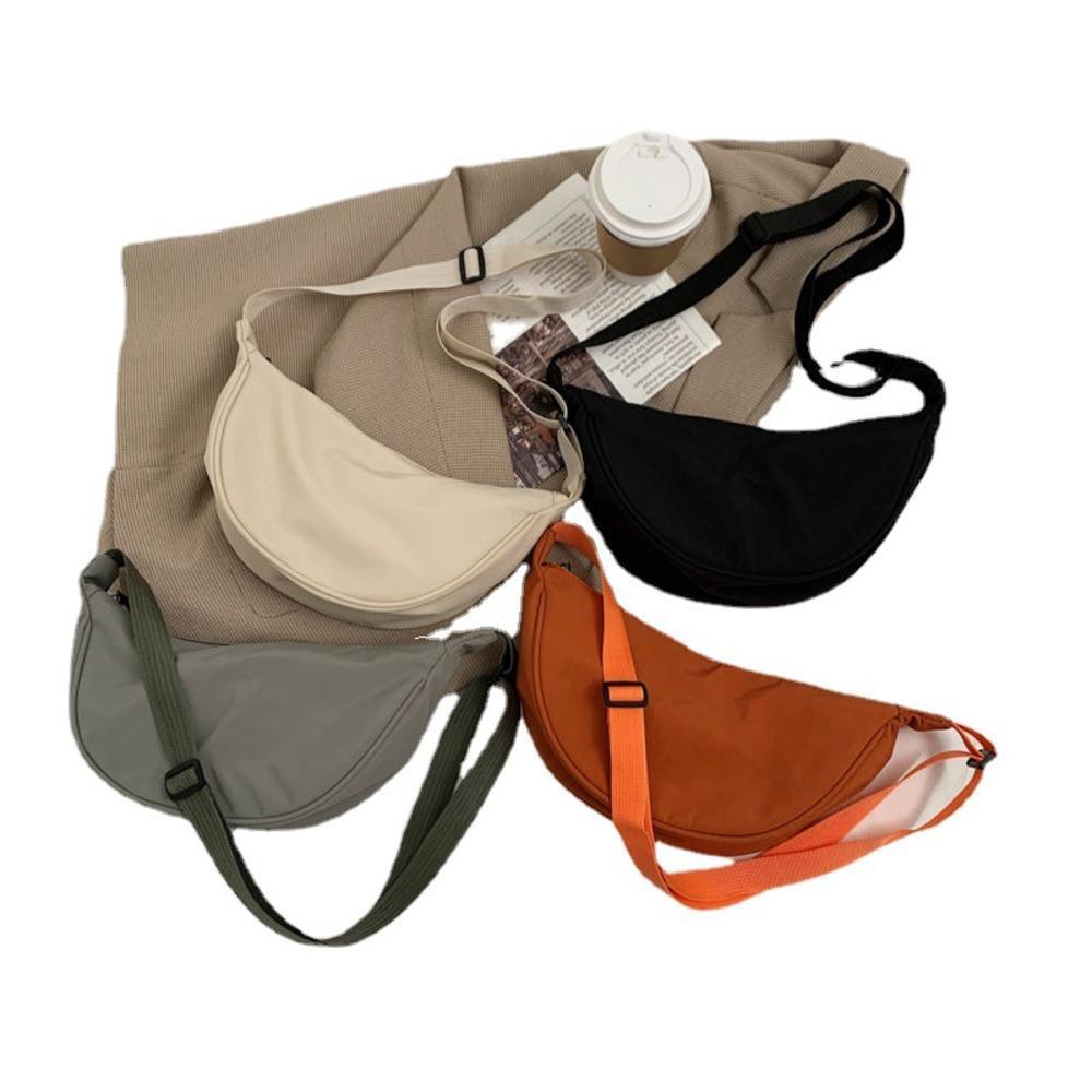 design Nylon messenger bag Stylish Small size Canvas material Women's bag Multiple compartments Shoulder strap Trendy dumpling bag for Casual use Travel accessory essential College students Commuting bag