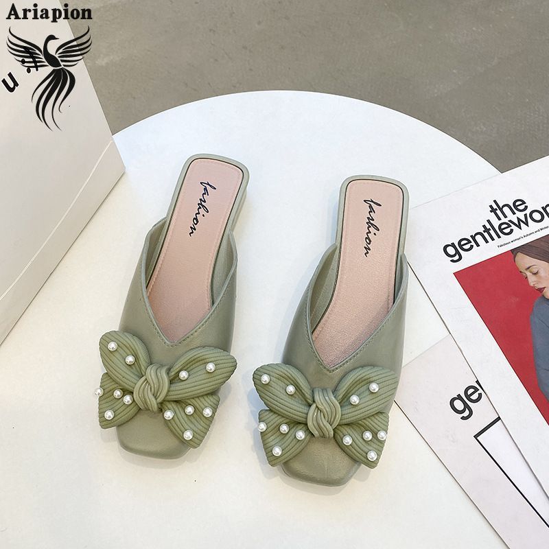 AriaPion丨Slip-on Mules Shoes Half Slippers New Bow Outdoor Slippers Women's Casual Women's Fashion Shoes ราคา 90 บาท*ส่งฟรี