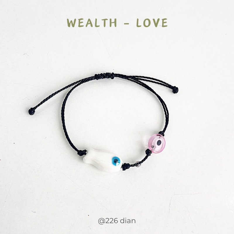 Vòng tay mắt quỷ và cá - evil eye