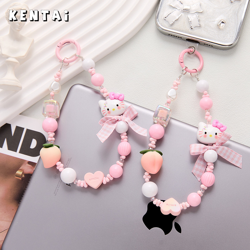 KENTAI สายโทรศัพท์น่ารักลายคิตตี้แคท ประดับผล đàoและโบว์ สร้อยคอแบบหวานสไตล์เกาหลีสำหรับกระเป๋าหรือข้อมือ ราคา 44 บาท*ส่งฟรี