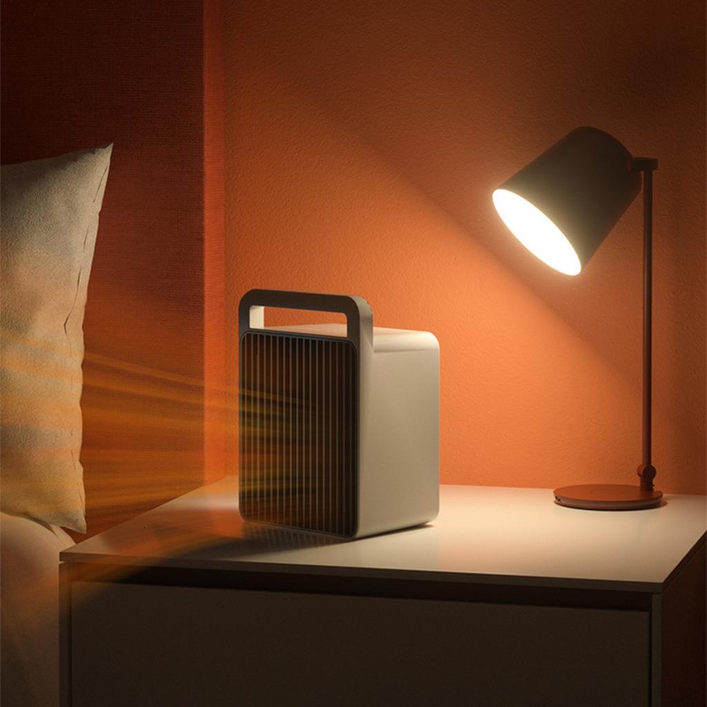 110V Fast Heating 900W PTC Ceramic Heating Electric Warmer Small Desk Heating Office Indoor Indoor Bedroom Hot Air Fan Giá 535,000 Đồng*Miễn phí vận chuyển