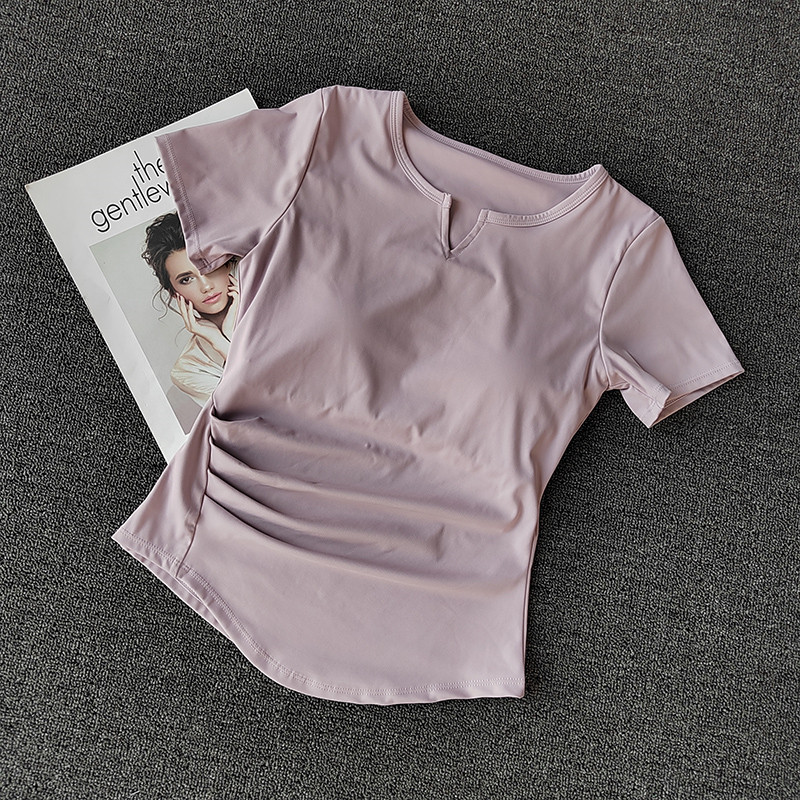 เสื้อยืดกีฬาผู้หญิงสไตล์ยุโรปและอเมริกา แขนสั้น ดีไซน์มีแผ่นเสริมหน้าอก สำหรับใส่ออกไปข้างนอกให้ดูผอมเพรียว และเสื้อยืดสำหรับวิ่งและออกกำลังกาย ราคา 147 บาท*ส่งฟรี