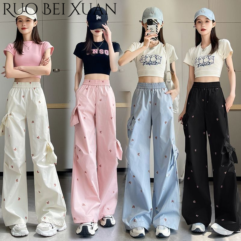 Ruo Bei Xuan Fashionable High-Waist Wide-Leg Pants with Cute Embroidery and Crop Top Set ราคา 6,029 บาท*ส่งฟรี