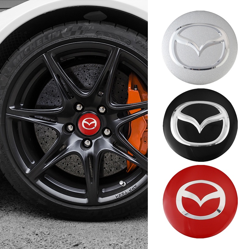 [OUS] 4Pcs Car Wheel Hub Center Cap Metal Emblem Stickers for Mazda 6 3 5 2 CX5 CX7 323 Demio Axela Atenza CX9 MX3 MX5 RX8 RX7 ราคา 82 บาท*ส่งฟรี