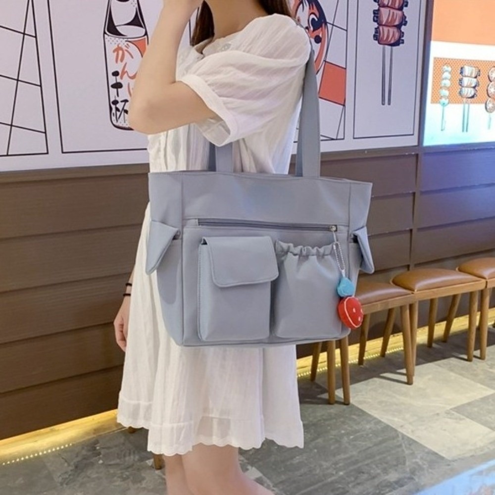HERWK Màu sắc đồng nhất Túi Tote Canvas Dung lượng lớn Nylon Túi đeo vai Nhật Bản Đơn giản Phong cách Hàn Quốc Túi học sinh Ngoài trời - 5
