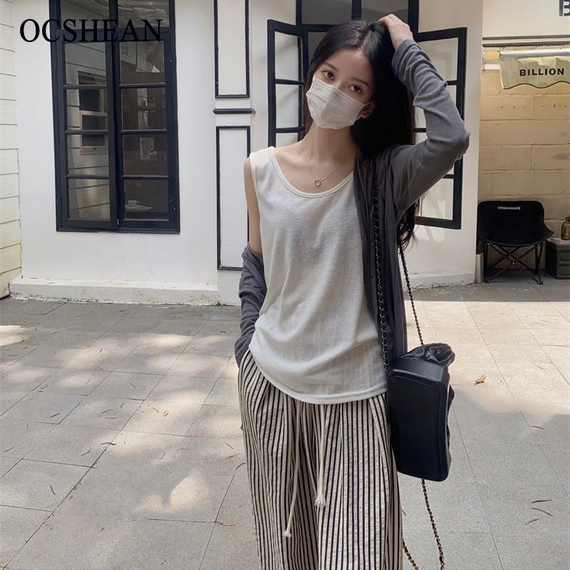OCSHEAN เสื้อกล้ามสายเดี่ยวเปิดหลังแบบคอ U ออกแบบสไตล์เกาหลีสำหรับฤดูร้อนเสื้อตัวในแขนกุด INS แมทช์ลุคง่ายใส่ด้านในทรงหลวมสำหรับผู้หญิง ราคา 72 บาท*ส่งฟรี
