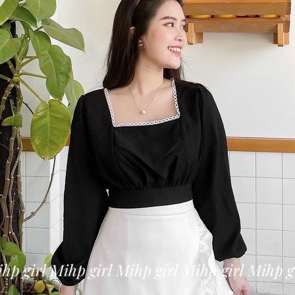 Áo croptop nữ thắt nơ lưng phối ren tay dài.
