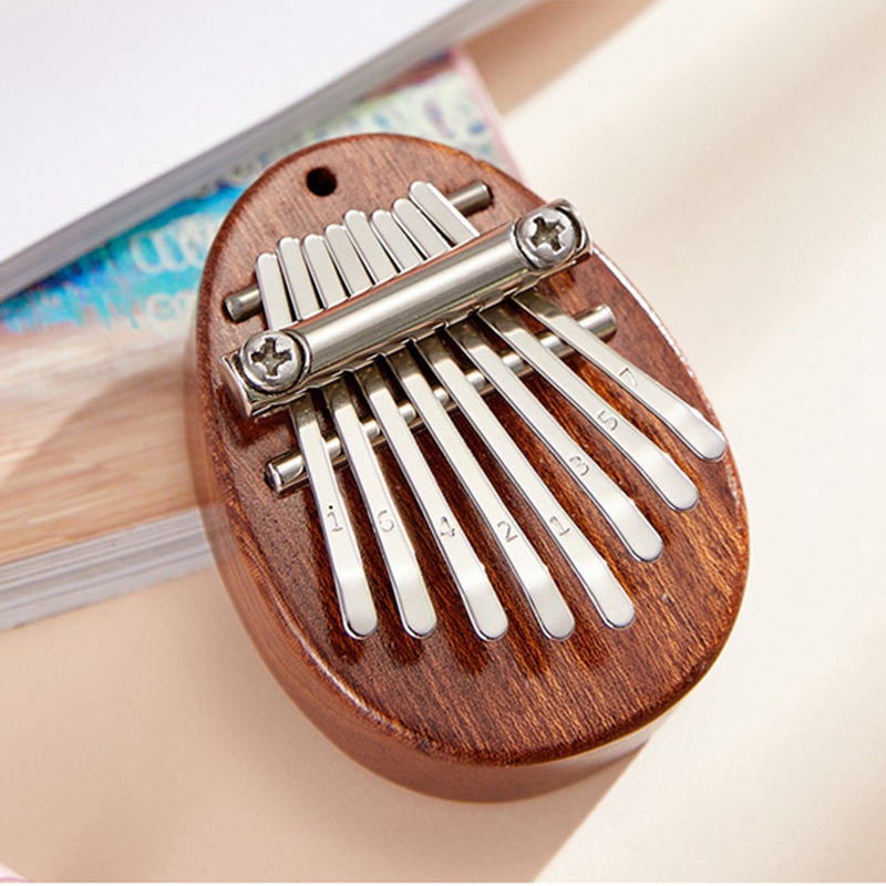 Mini Thumbhard 8-Tone Piano Cute Thumb Piano Musical Good Portable Instrument Gift for Beginners Music Lovers