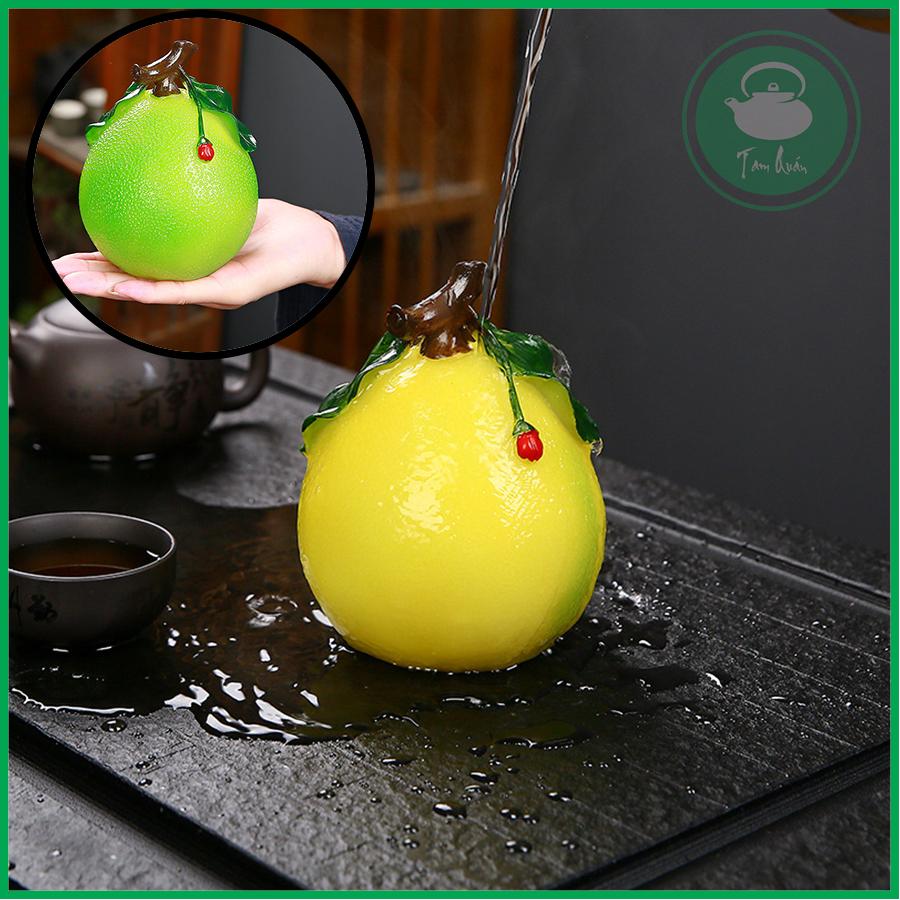 Quả bưởi đổi màu trang trí bàn trà