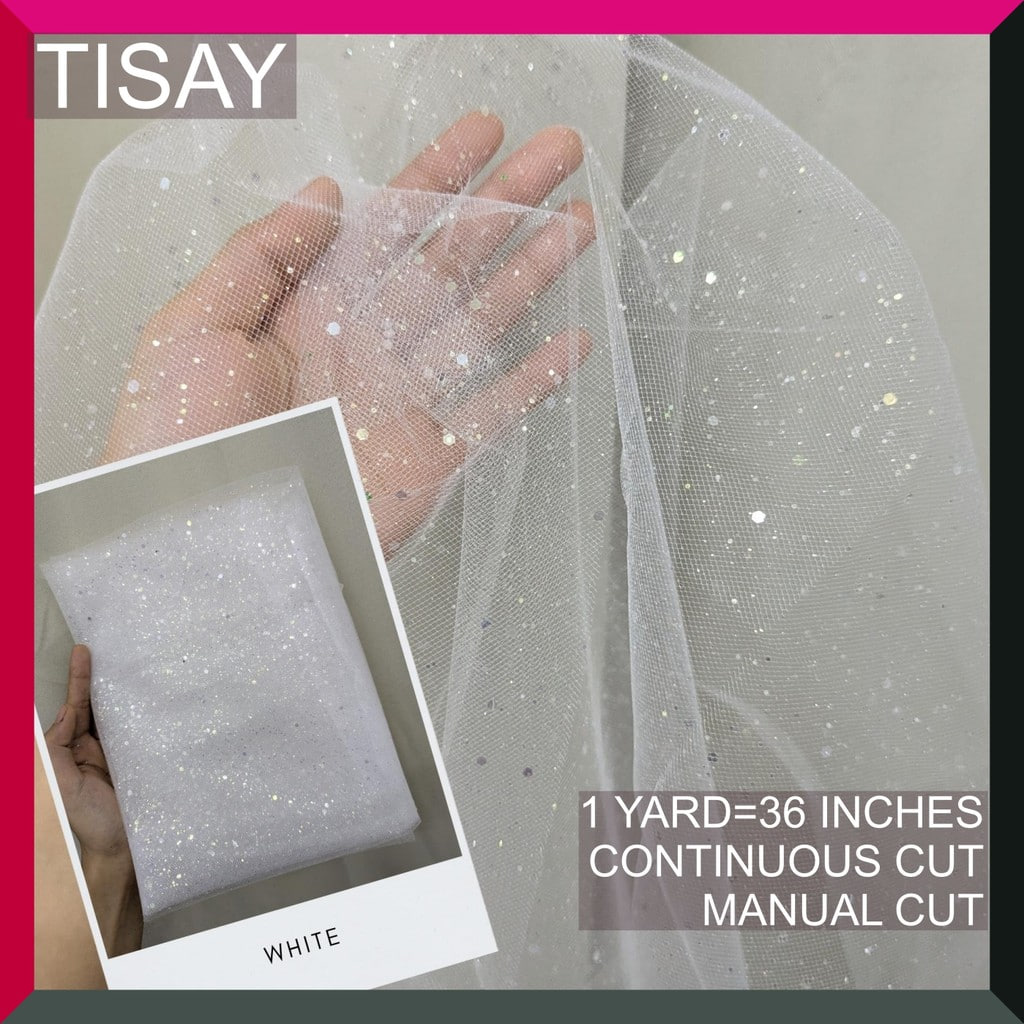 GLITTERED SILENKA FABRIC TULLE WITH FALLING GLITTERS PER YARD IS 36 INCHES LENGTH AND 60 FIXED WIDTH