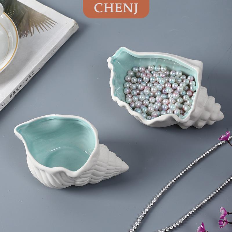 [COD] CHENJ ถาดเครื่องประดับเซรามิก1ชิ้นถาดทรงหอยสังข์รูปปลาดาวห่วงยางเซรามิกรูปเปลือกหอยสำหรับตกแต่งธีมมหาสมุทร ราคา 181 บาท*ส่งฟรี