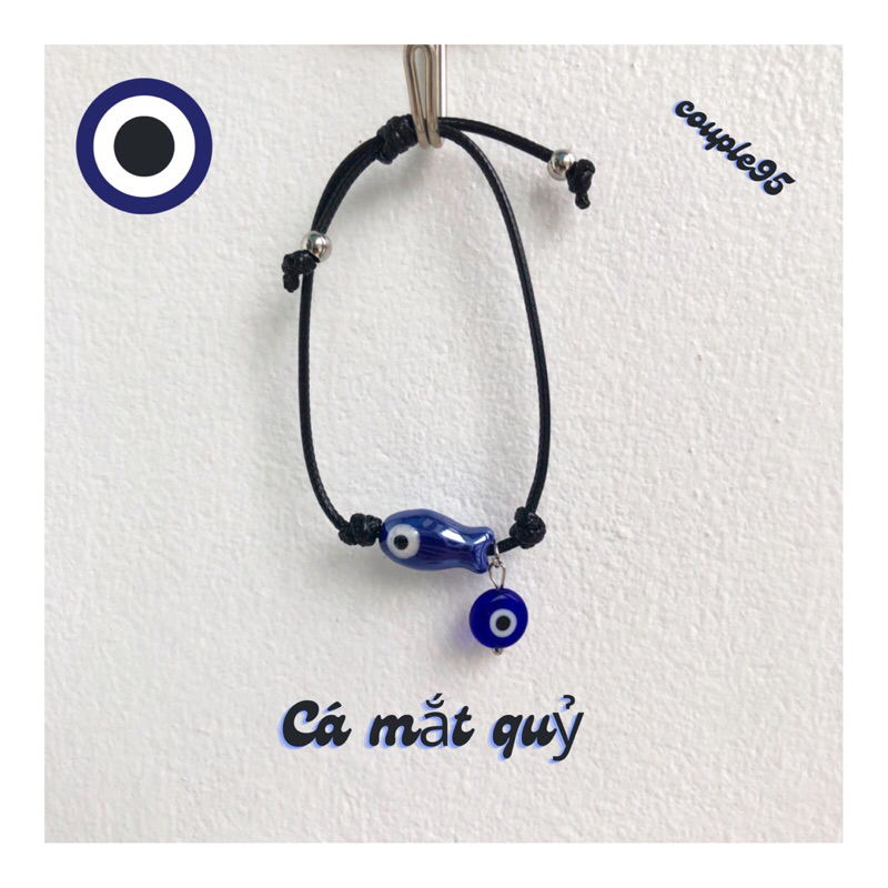 Vòng tay cá mắt quỷ thắt giữa dây rút may mắn