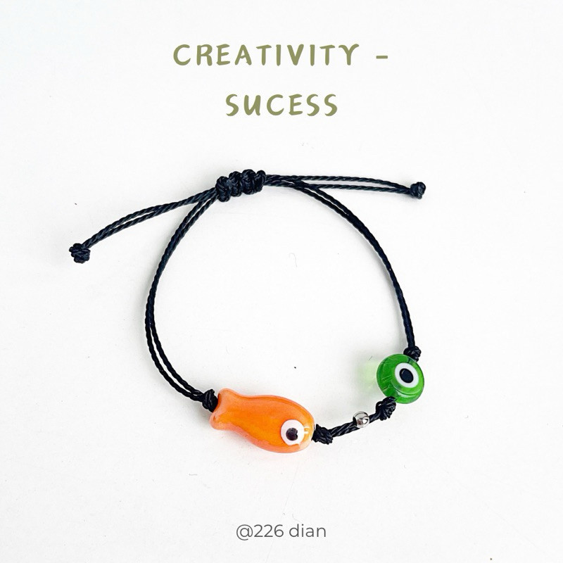 Vòng tay mắt quỷ và cá - evil eye