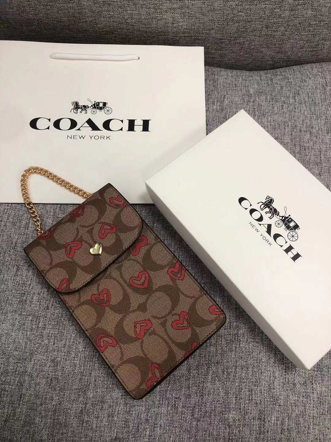 coach handphone pouch