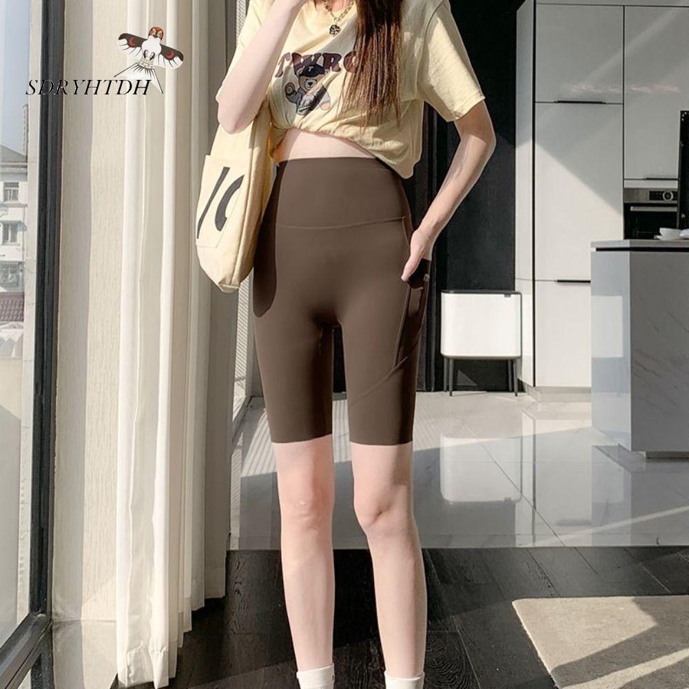 SDRYHTDH Eo cao Quần legging nữ có túi Ngắn Không đường may Quần lửng nữ chạy bộ Định hình cơ thể Bó sát Yoga