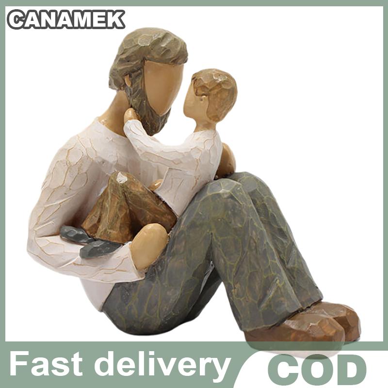 CANAMEK รูปปั้นพ่อและลูกชายรูปปั้นเรซิ่นประดับครอบครัวงานฝีมือสำหรับบ้านห้องนอนห้องนั่งเล่นโต๊ะตกแต่ง ราคา 203 บาท*ส่งฟรี