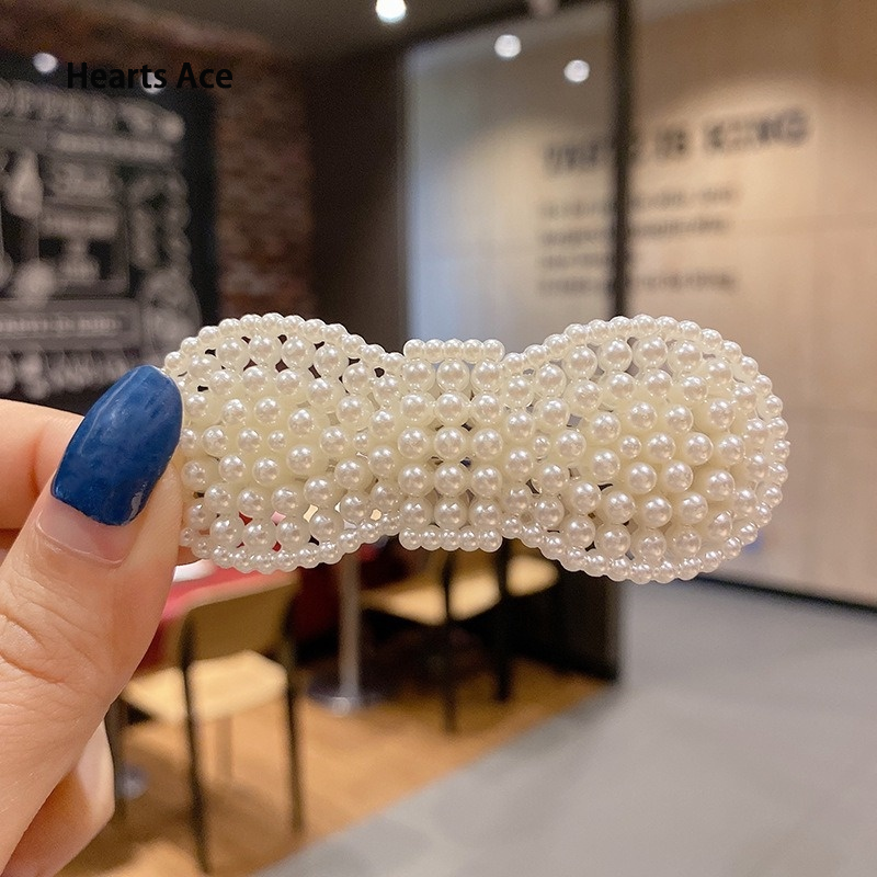 Simple metal artificial pearl roof clip, Korean fashion, suitable for women ราคา 6 บาท*ส่งฟรี