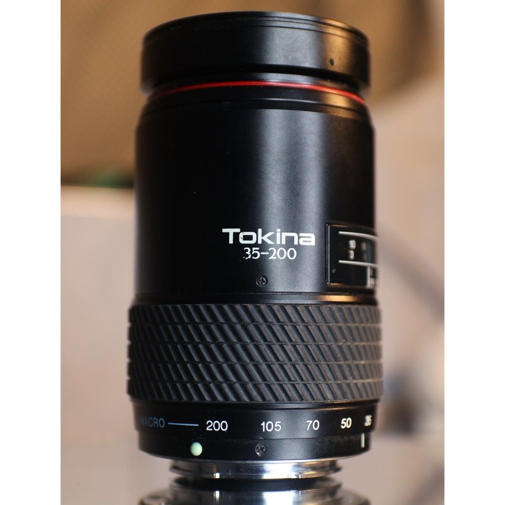 ống kínhTokina AF 35-200mm f/4.5-5.6 (Sony A) - kính 95% (kính sau có nhiều bụi bé)