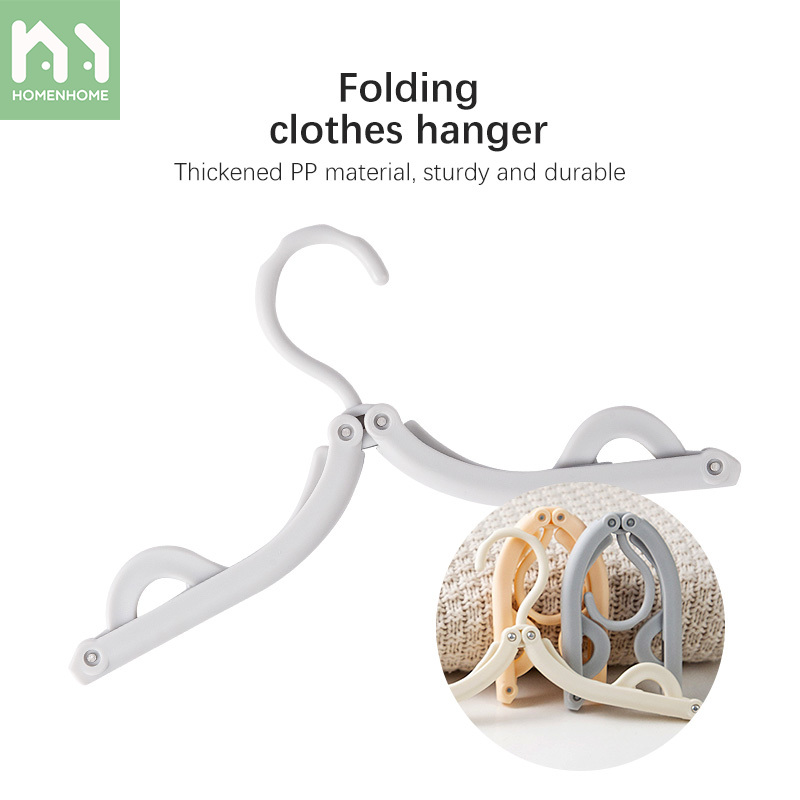Homenhome 1PC Household foldable and portable plastic hanger for outdoor travel ราคา 36 บาท*ส่งฟรี