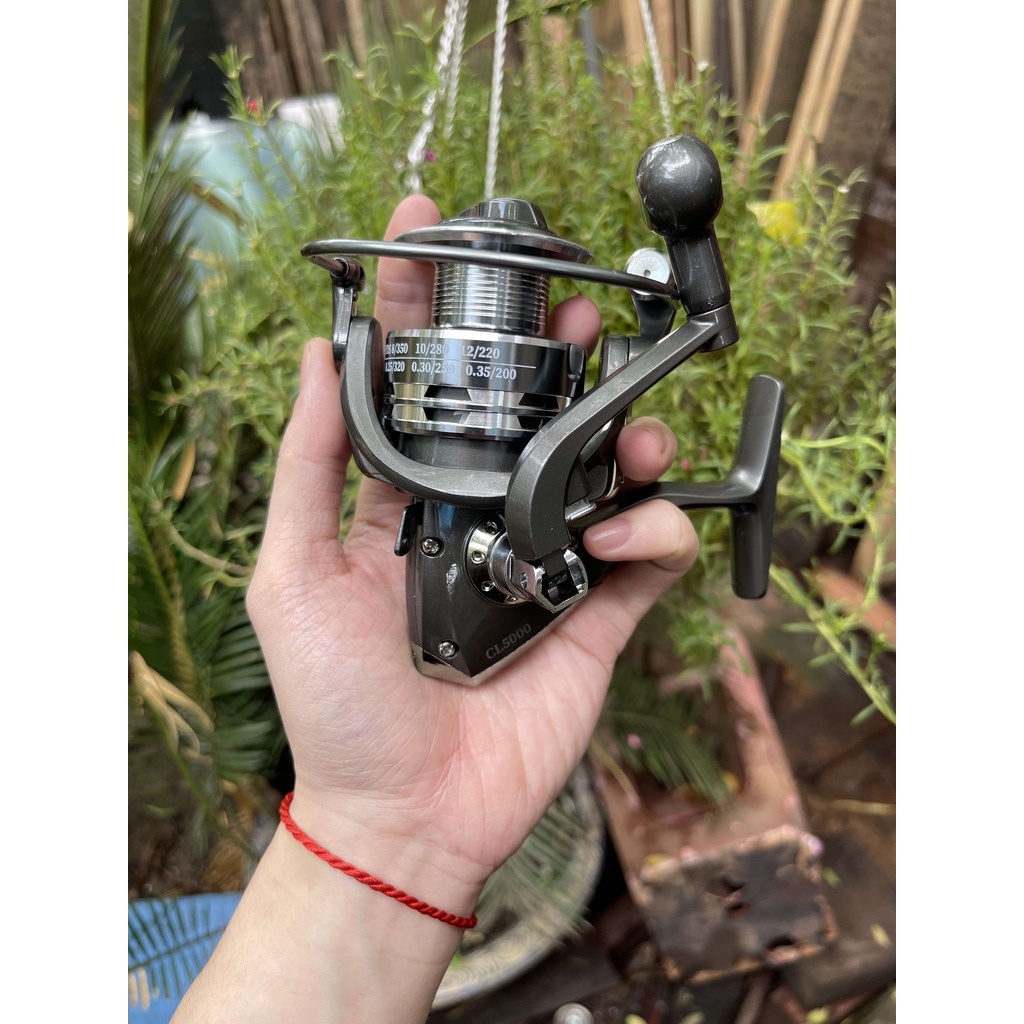 Máy câu cá yumoshi cl 3000 - 7000 full kim loại - 12 bạc đạn màu xám đen siêu đẹp anhnamfishing