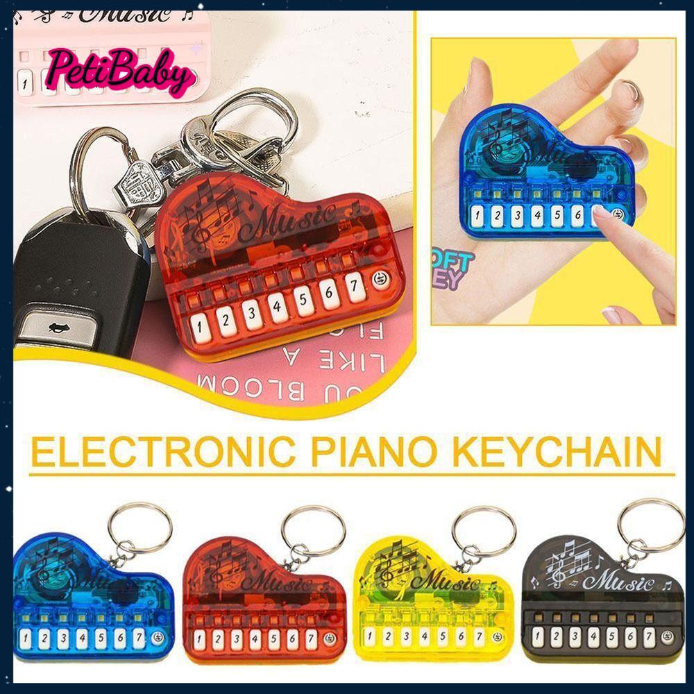 Petibaby Đồ chơi nhạc cụ Đàn Piano Keychain Đồ Chơi Trẻ Em Mini Sáng Đồ chơi âm nhạc Đàn Piano Xách Tay Trong Suốt bàn phím điện tử Keychai Trẻ Em