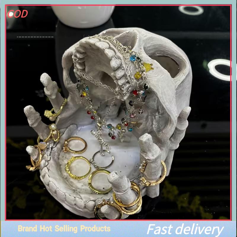 [COD]PkYeG💖💖💖 กล่องเก็บเครื่องประดับรูปหัวกะโหลกสุดสร้างสรรค์ของตกแต่งฮาโลวีนแบบกอธิคกล่องเก็บของตั้งโต๊ะทำจากเรซินเหมาะสำหรับใส่แหวนต่างหูสร้อยคอ-เครื่องประดับตกแต่งบ้านศิลปะ ราคา 289 บาท*ส่งฟรี