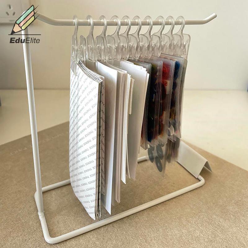 EduElite ชุดเดรสพวงกุญแจคลิปหนีบแขวนทำจากพลาสติกประดับโต๊ะสำหรับวางเครื่องประดับ ราคา  20 บาท*ส่งฟรี