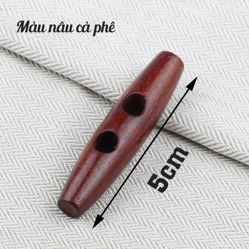 Nút gỗ dài 5cm 2 lỗ màu nâu dùng trang trí áo túi xách nón