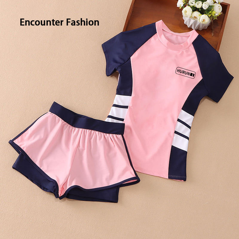 Women's short sleeved swimsuit, large size, children's boxing underwear, two-piece swimsuit, quick drying, suitable for students ราคา 220 บาท*ส่งฟรี