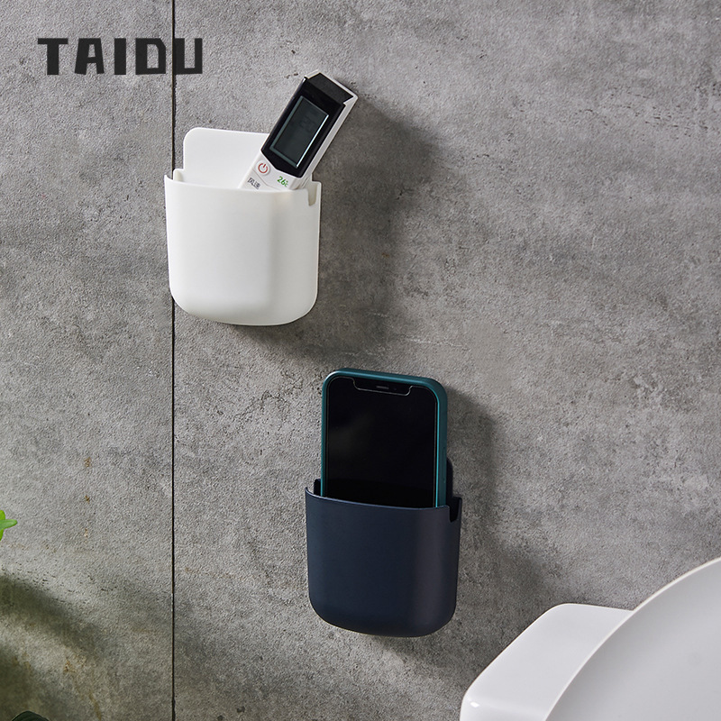 Wall-mounted bedside mobile phone charging rack bracket remote control air conditioner remote control board storage box punch-free bathroom ราคา 15 บาท*ส่งฟรี