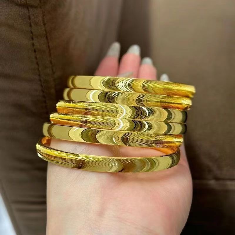 RAISS Minimalist Cat Eye Bracelet Solid Gold Wave Design Fade Proof Titanium Steel Couple Bands Luxury Jewelry for Women Men ราคา 199 บาท*ส่งฟรี