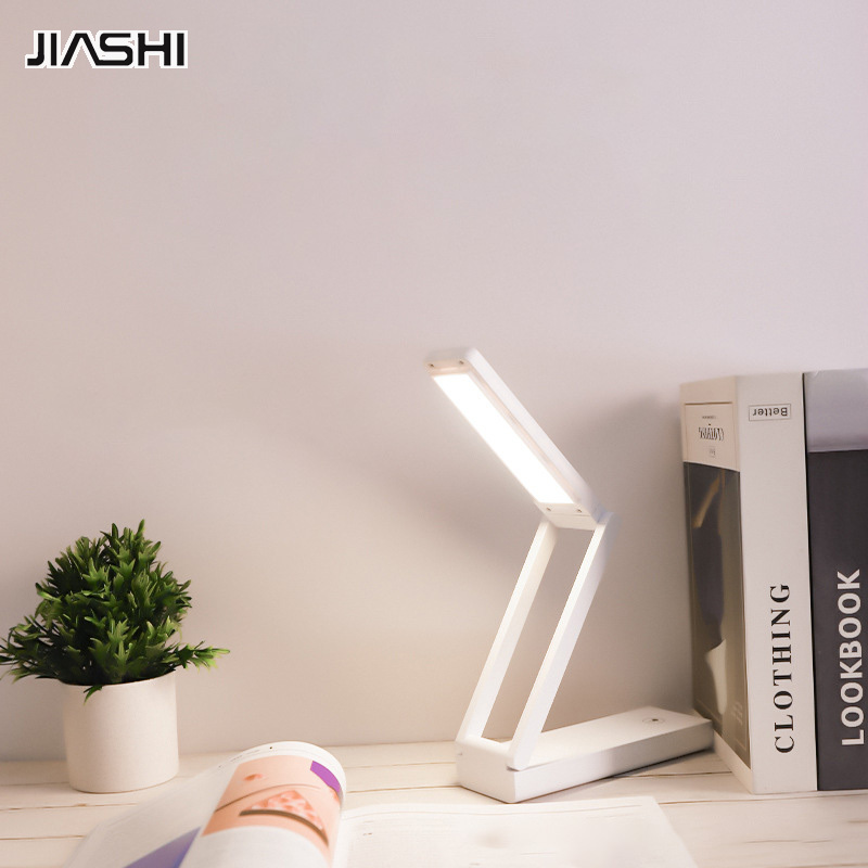 JIASHI Student dormitory eye protection desk lamp bedroom study desk mini desk lamp rechargeable foldable portable led reading lamp ราคา 216 บาท*ส่งฟรี