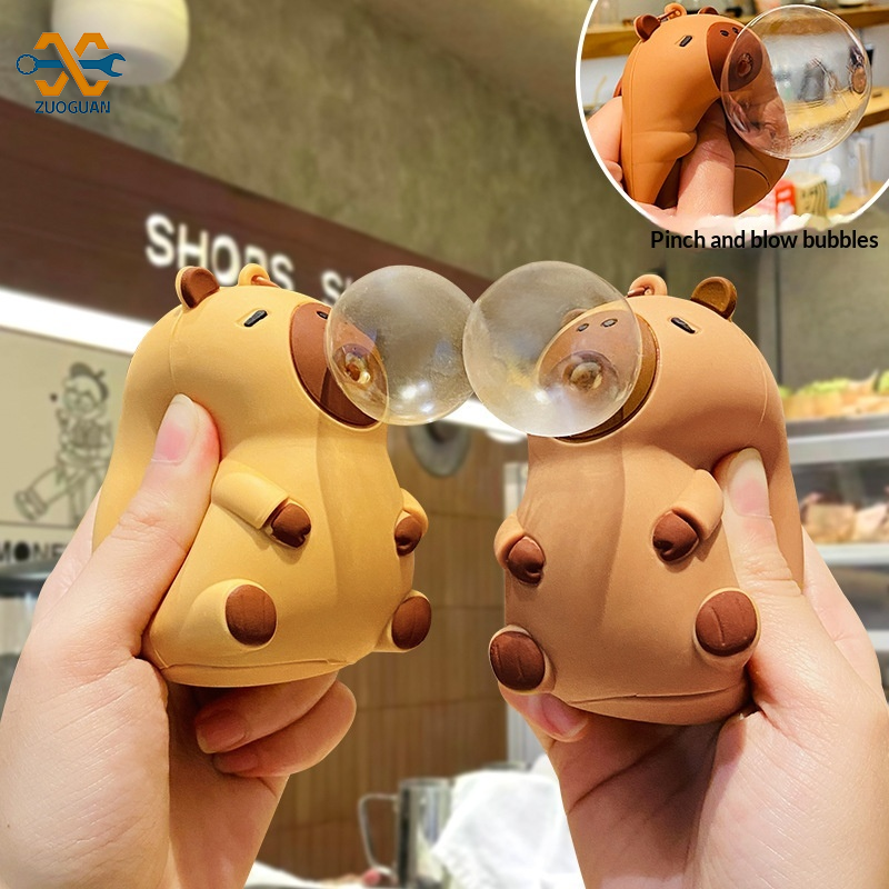 Zuoguan Squishy Toys, Squishy Squeeze Toys Anti-Stress Toys, Slow Squishies, Capybara, Bubble Blower Toy, Stress Relief, Cute Animal Keychain, Fun Squeeze Gift ราคา 24 บาท*ส่งฟรี