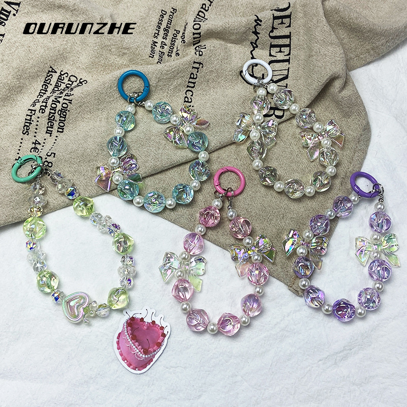 OURUNZHE สายคล้องมือถือประดับดอกไม้ลูกปัดไข่มุกและคริสตัลสไตล์ชิคๆ สำหรับผู้หญิง ราคา 33 บาท*ส่งฟรี