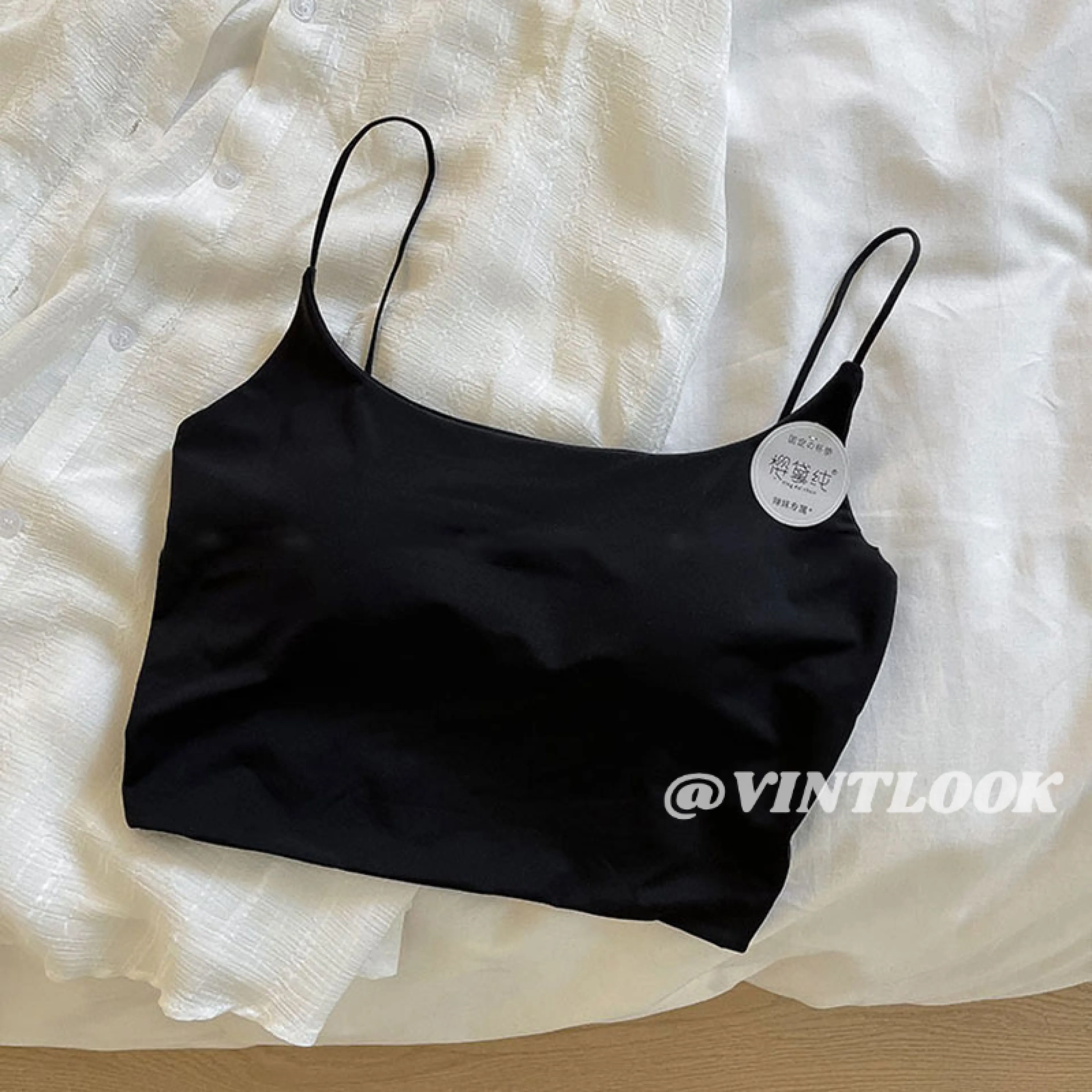 Vintlook Curiosities Boutiqu Solid Color Short Ice Silk Tank Top with a Beautiful Top and Back.