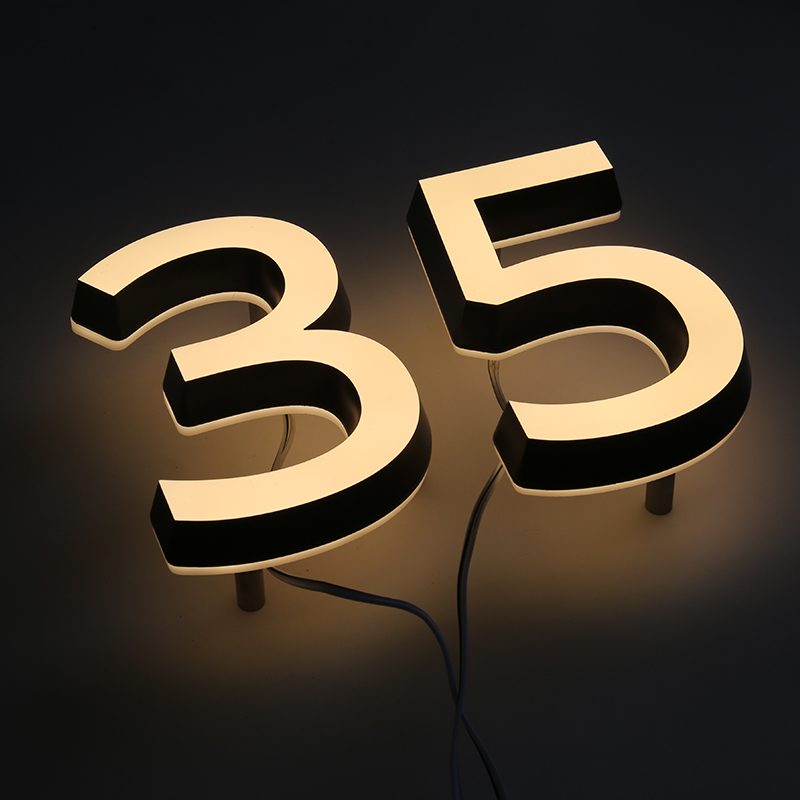 home number sign with light