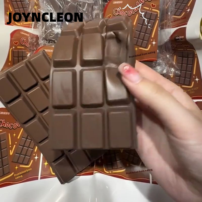 JOYNCLEON Soft Flexible Toy Shaped Soft Chocolate Bar for Stress Relief – Realistically made of PU foam, the perfect gift for adults and teenagers. ราคา 65 บาท*ส่งฟรี