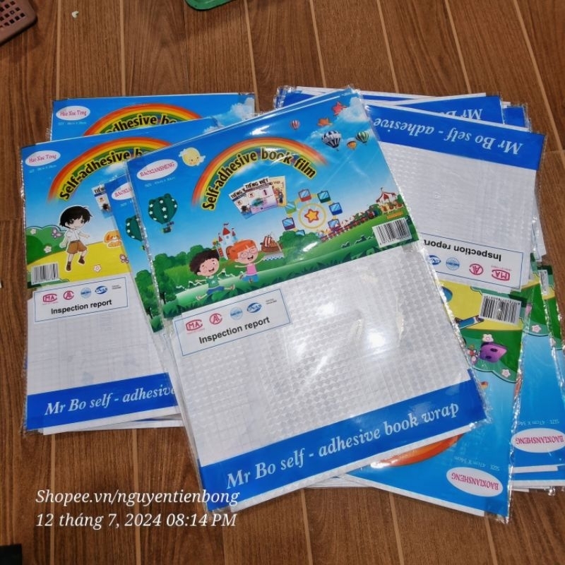 30 tập bọc sách đề can /bọc vở có keo dán sẵn