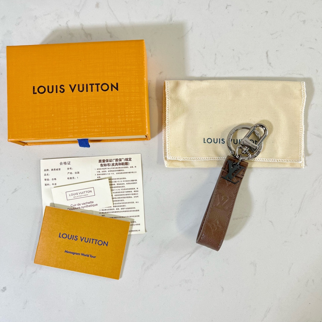 Louis Vuitton Monogram Dragonne Key Holder - A World Of Goods For