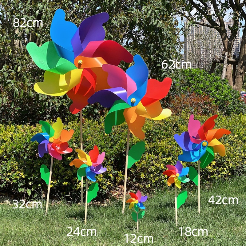 MlaDen กังหันลม 7 สี พลาสติกเส้นผ่านศูนย์กลาง 30 เซนติเมตร สำหรับประดับสวน DIY ของเล่นกลางแจ้ง ราคา 27 บาท*ส่งฟรี
