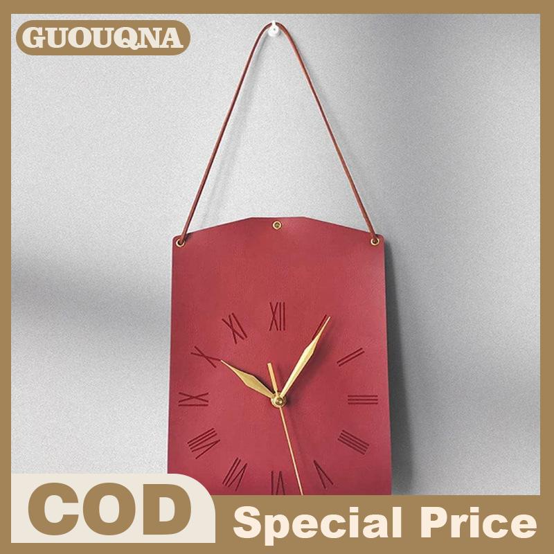 GUOUQNA นาฬิกาแขวนผนังหนัง PU สไตล์วินเทจนาฬิกาแขวนผนังสไตล์โมเดิร์นทรงกระเป๋านาฬิกาไร้เสียงสำหรับตกแต่งห้องนั่งเล่นห้องนอนนาฬิกาแบบย้อนยุค ราคา 190 บาท*ส่งฟรี
