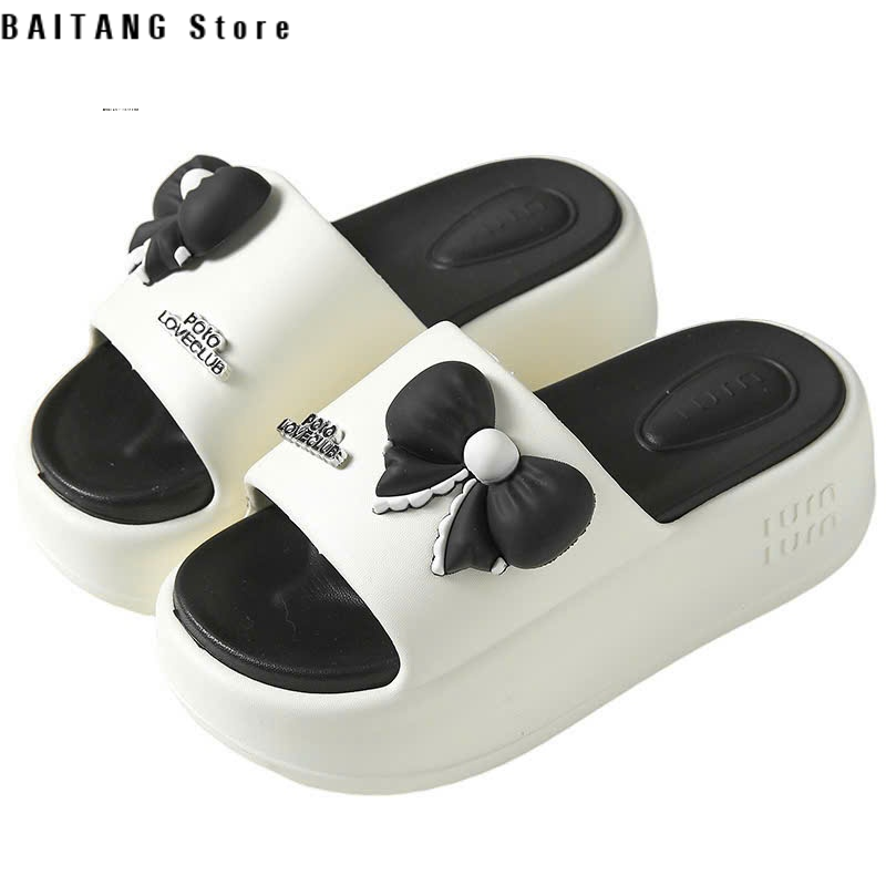 Dép lê nữ bản nơ dán đế 4cm thời trang mùa hè 2025 chất PU mềm dẻo êm chân thương hiệu Saki phù hợp mọi phong cách miễn phí vận chuyển hàng mới khuyến mãi bảo hành chính hãng